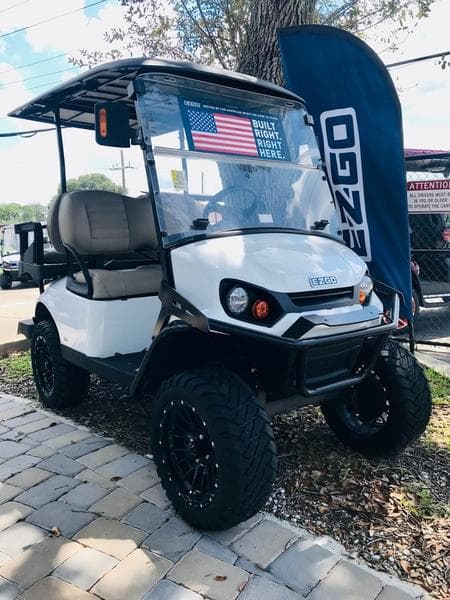 2024 E-Z-GO Express S4 ELiTE Lithium — Bright White Lifted PTV — Zero-Maintenance Power